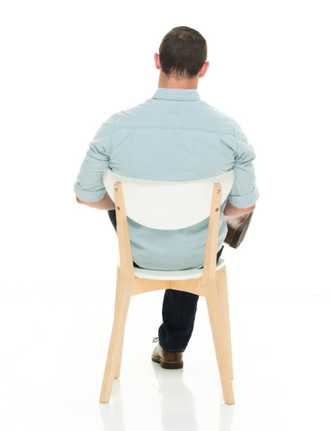istock Rear view of charming man seated 922299416