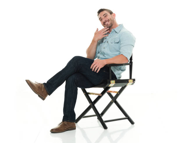 istock Handsome man happy and seated 922304466