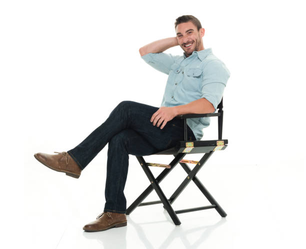 istock Handsome man happy and seated 922304472