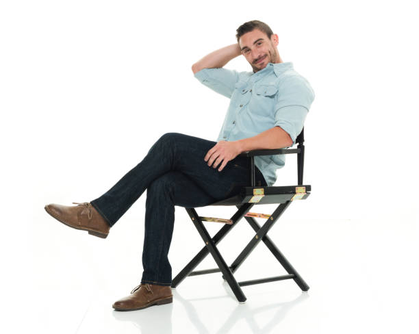 istock Handsome man happy and seated 922304486