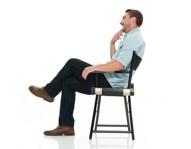 istock Handsome man happy and seated 922304558