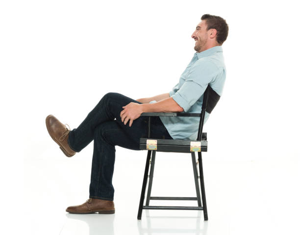 istock Handsome man happy and seated 922304644