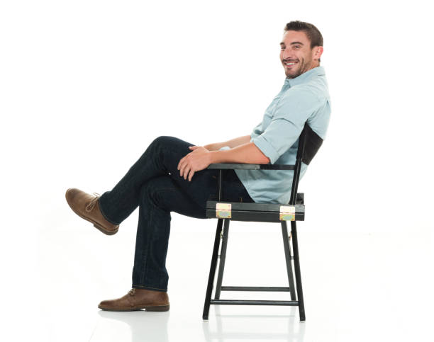 istock Handsome man happy and seated 922304682