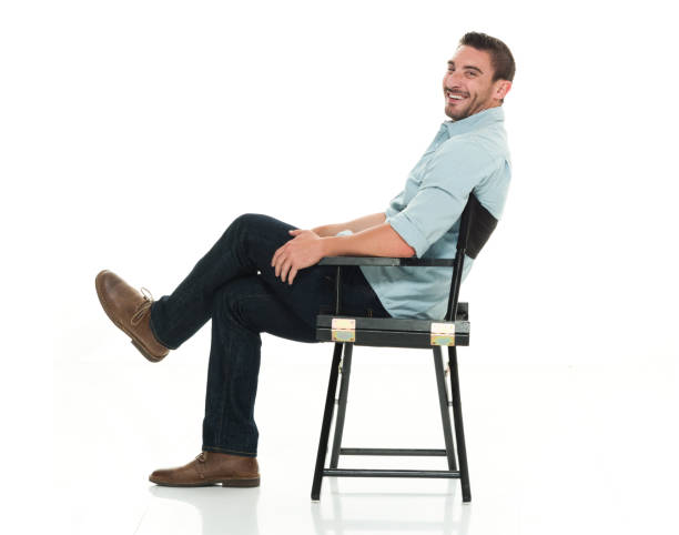 istock Handsome man happy and seated 922304706