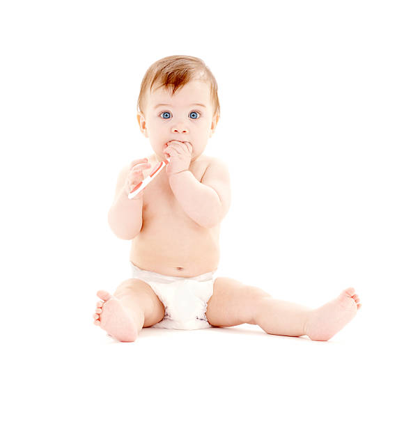istock baby boy in diaper with toothbrush #3 92230500