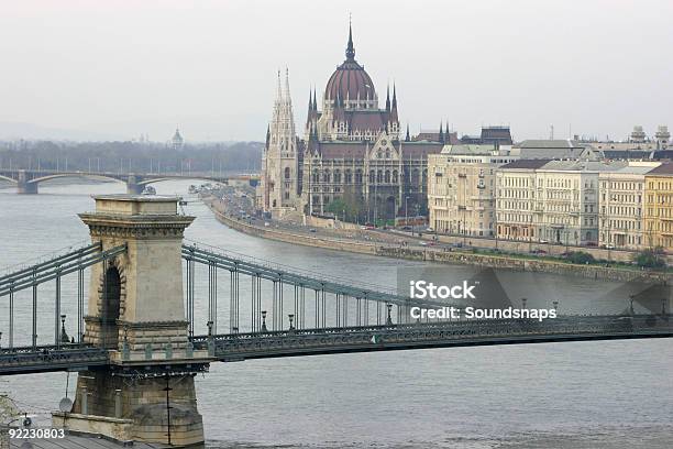 Ancient Chain Bridge Over Danube Parliament Building Stock Photo - Download Image Now