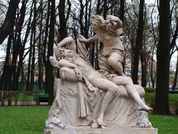 Photo of Marble statue of amour and psyche sculpture at Letniy sad park in Saint-Petersburg, Russia