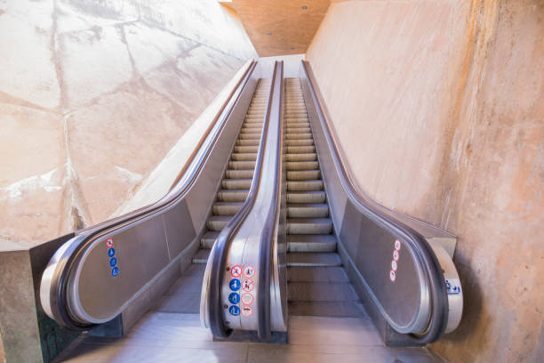 istock escalator going up to upper Toledo city 922311456