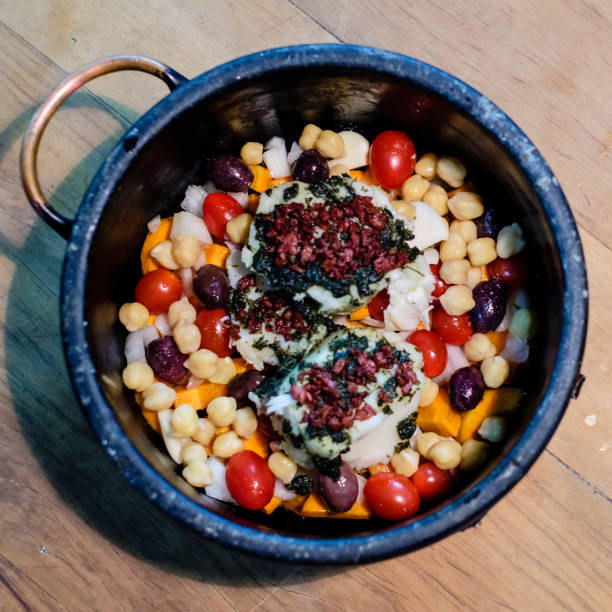 istock pot of vegetables and cod fish ready to be consumed 922318086