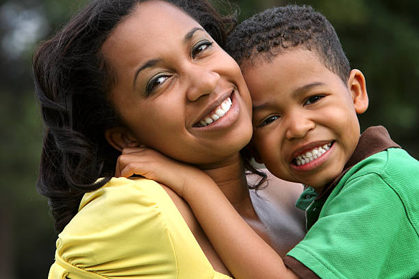 istock A mother and her son smiling at the camera 92232955