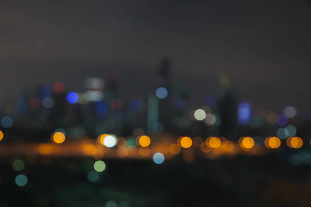 istock abstract defocused bokeh business cityscape area at night light sky background 922330432