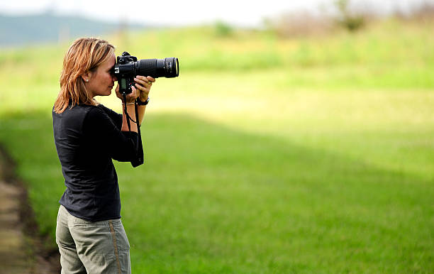 istock Girl photographer with camera 92233482