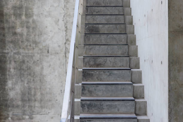istock Concrete Staircase with concrete wall out of building 922338142