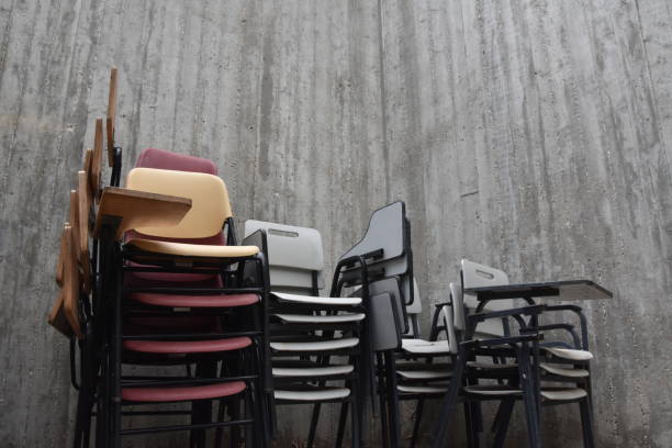 istock A pile of student chairs 922338308