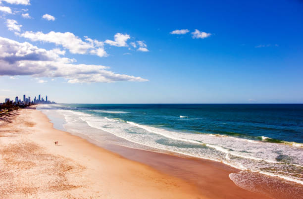 istock Couple on isolated Gold Coast beach 922347678