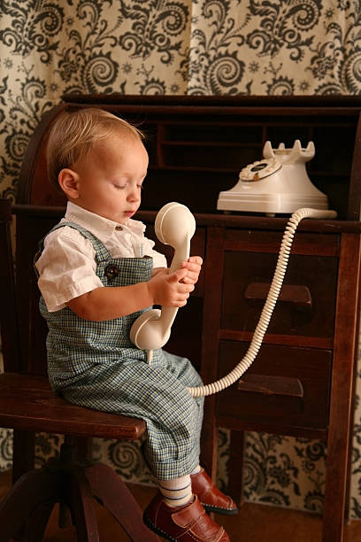 istock Toddler on Antique Phone2 92234774