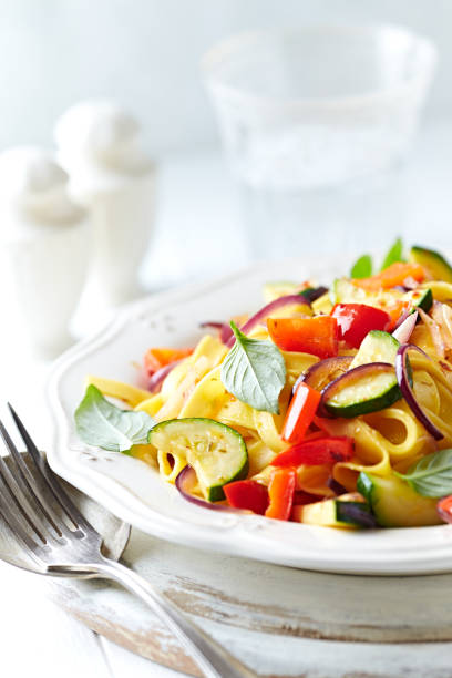 istock Tagliatelle with zucchini, pepper and red onion 922347992