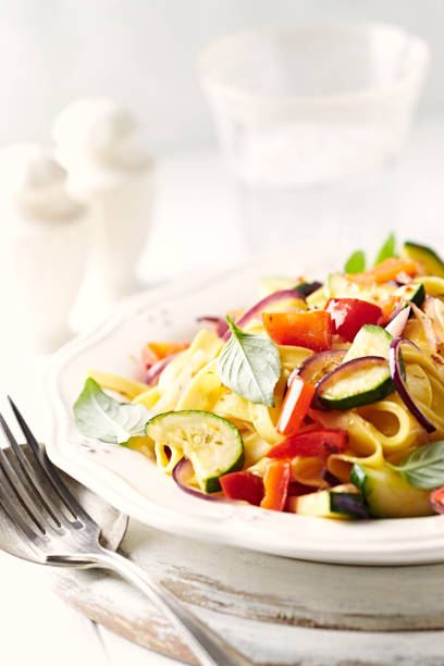 istock Tagliatelle with zucchini, pepper and red onion 922347994