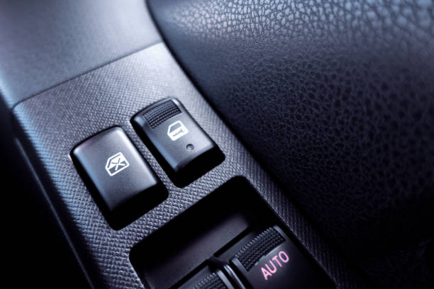 istock Window button control electric for vehicle car closeup, transport concept 922348038