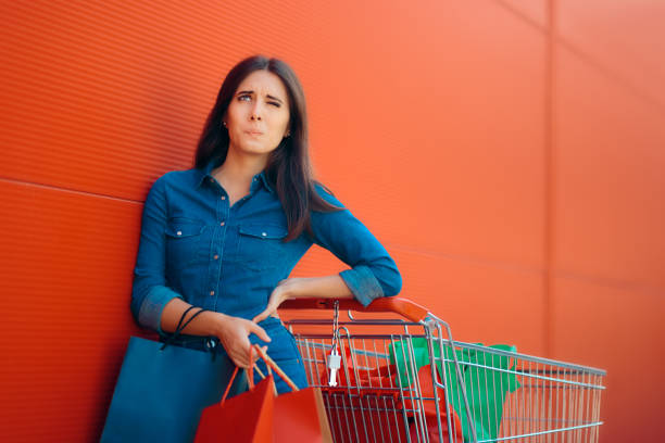 istock Tired Woman Having Back Problems while Shopping for Groceries 922348098