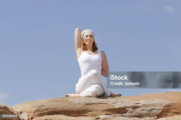 Gomukhasana Foto de stock y más banco de imágenes de Actividad - Actividad, Actividades recreativas, Adulto