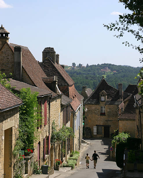 istock Couple walking down French Street 92235515