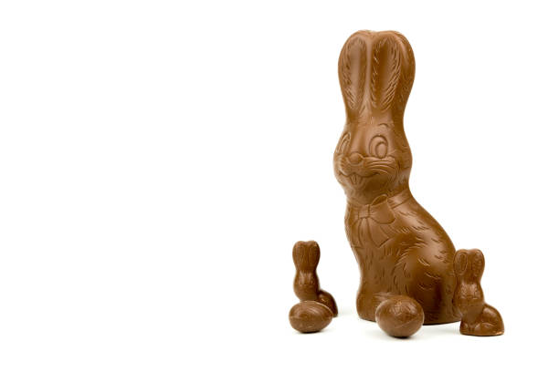 istock Easter bunnies and Easter eggs made from chocolate isolated on white 922363284