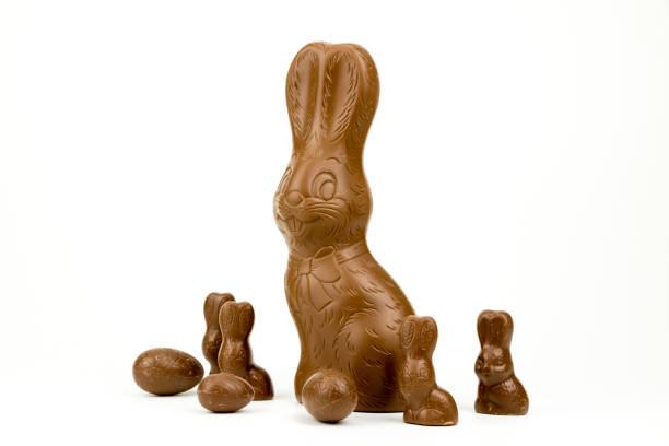 istock Easter bunnies and Easter eggs made from chocolate isolated on white 922363374
