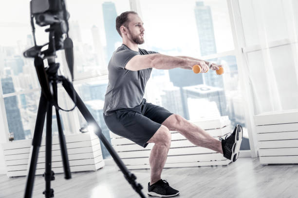 istock Nice male blogger demonstrating mixed training 922363548