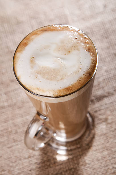 istock coffee latte with closeup froth on rustic 92236783