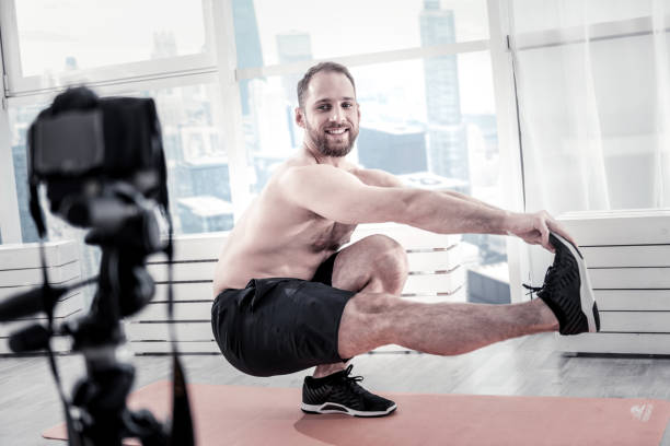 istock Energetic male blogger inspiring subscribers 922367988
