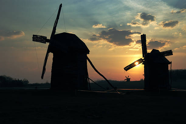 istock Old windmills against the sunset cloudy sky, Pirogovo, Kiev, Ukraine 92236802