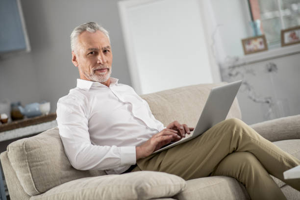 istock Competent businessman working at home 922369384