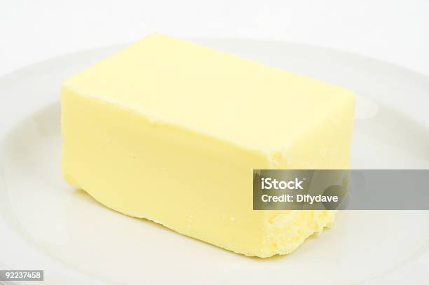 Foto de Pat De Manteiga Em Um Prato e mais fotos de stock de Bloco - Bloco, Manteiga, Amarelo