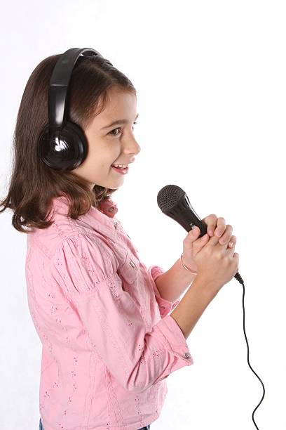 istock Young Girl / Child Singing With Microphone 92237468