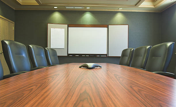 Conference Table and Blank Whiteboard stock photo
