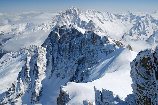istock Mountain range among snow and clouds, the Alps 92238276
