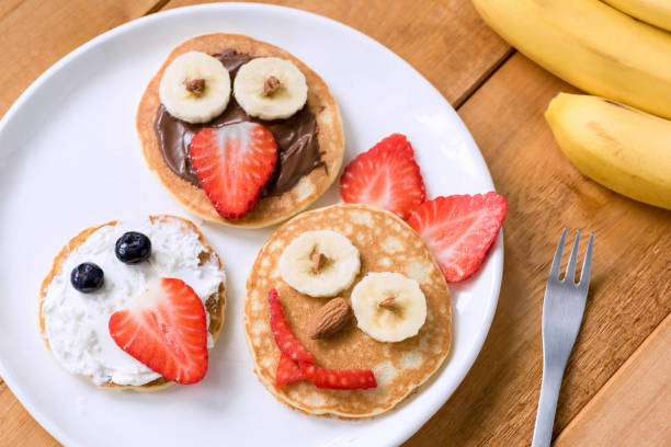 istock Pancakes With Funny Faces Decorated For Kids 922383524