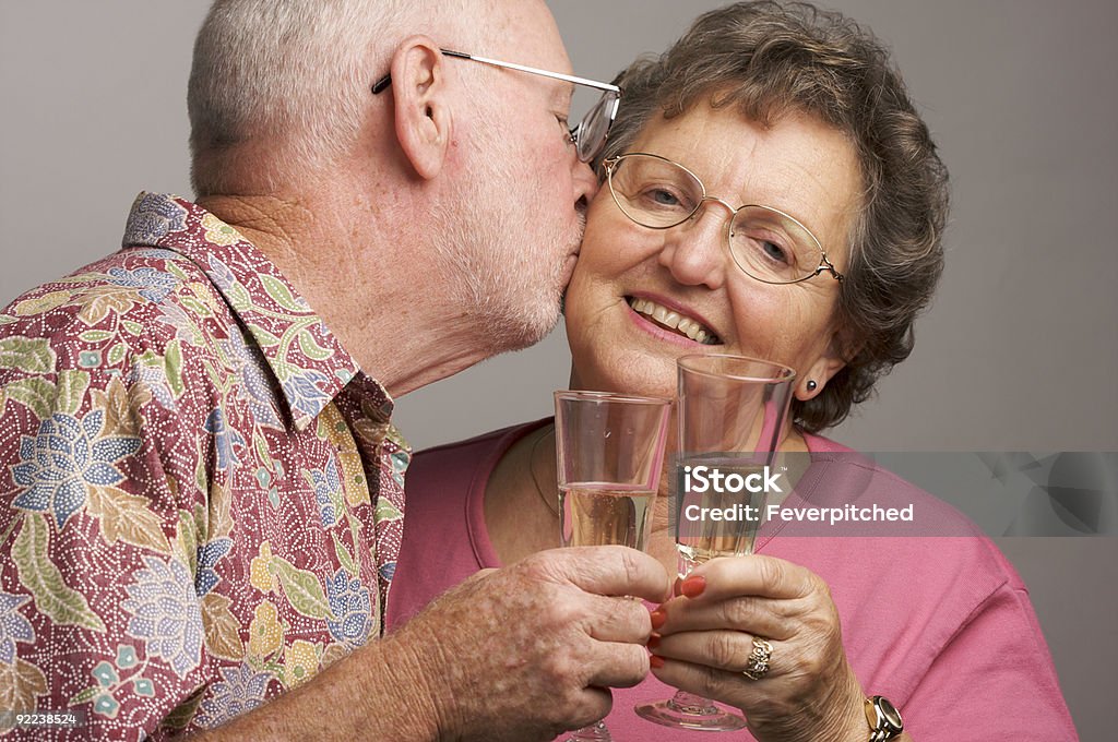 Happy Senior Couple Toasting Champagne  Active Seniors Stock Photo