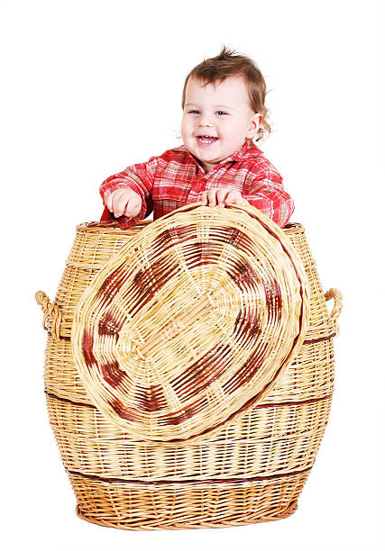 istock Baby boy sitting in basket 92238960