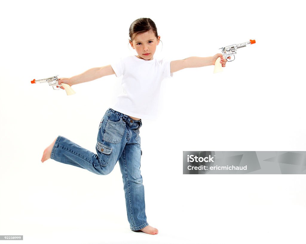 Young cowgirl con una pistola de juguete - Foto de stock de Pistola de Juguete libre de derechos