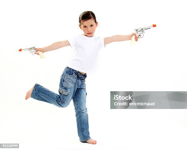 Young Cowgirl Con Una Pistola De Juguete Foto de stock y más banco de imágenes de Pistola de Juguete - Pistola de Juguete, Niñas, 6-7 años