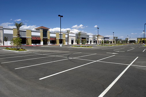 brand new construction strip mall in the suburbs. 