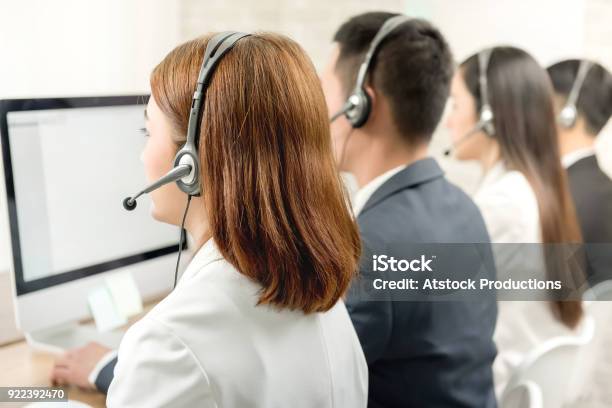 Back View Of Asian Telemarketing Customer Service Agent Team Stock Photo - Download Image Now