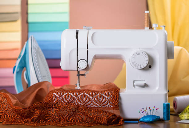 istock Electric sewing machine and finished item, sewing accessories 922403966