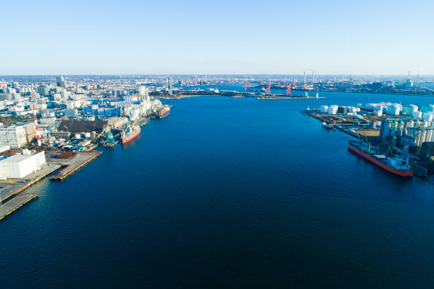 istock Sunny sea and industrial area. 922404214