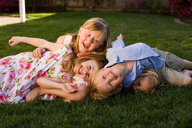 istock Group of Children Smiling and Hugging 92240492