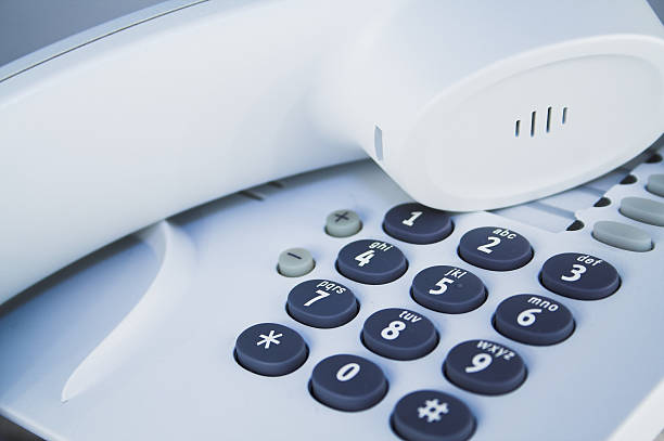 istock An office telephone with the receiver off 92240578