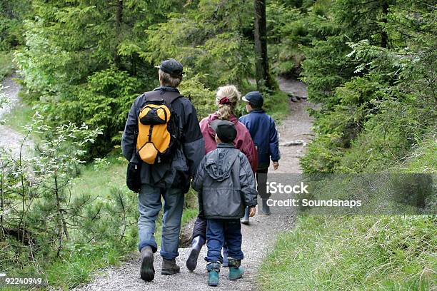 Family Hike On Wooded Path Stock Photo - Download Image Now - Family, Hiking, Rear View