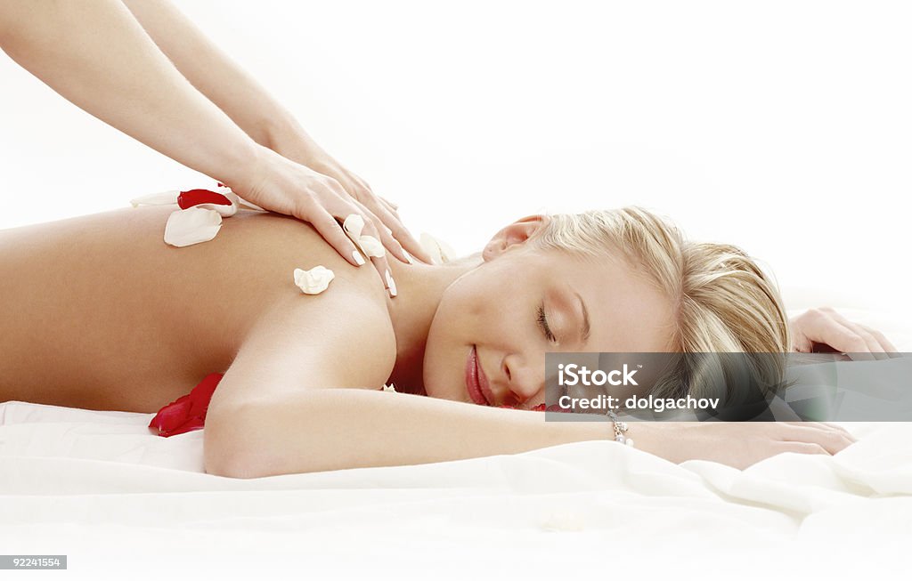 professional massage with flower petals #2  Back Stock Photo